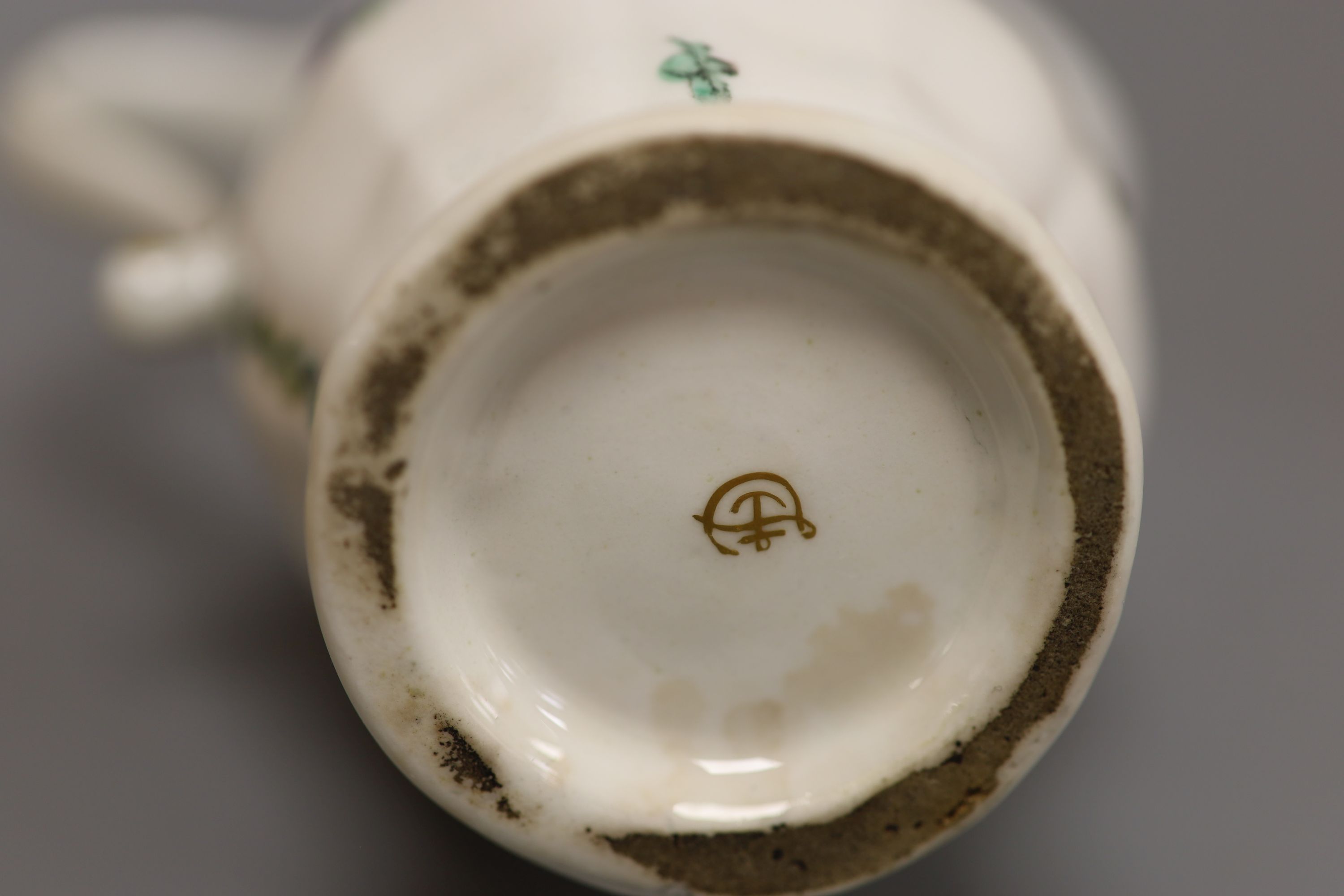 A Derby moulded jug, painted with flowers in manner of Edward Withers, c.1772, height 12cm